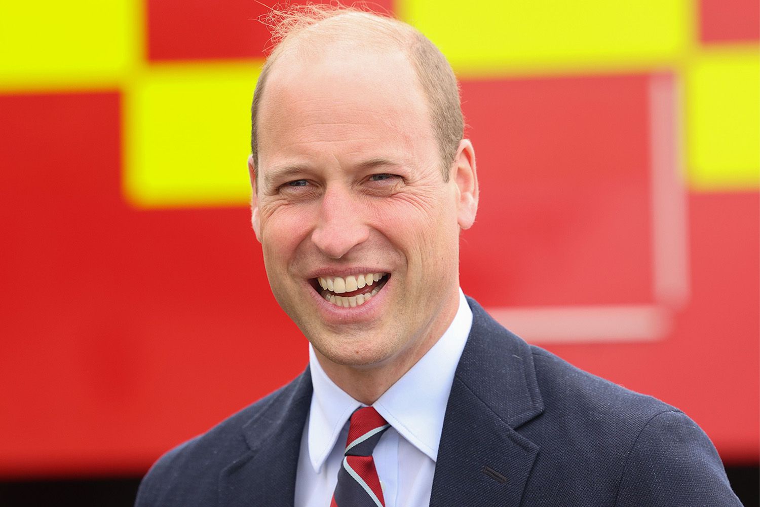 Prince William, Prince of Wales is seen laughing after a simulated fire response exercise during an official visit at RAF Valley on July 09, 2024 in Holyhead, United Kingdom