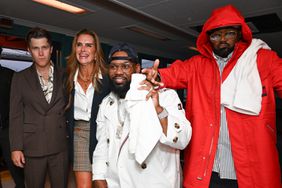 Colin Jost, Brooke Shields, Raekwon and Ghostface Killah at Tommy Hilfiger RTW Spring 2025 as part of New York Ready to Wear Fashion Week held aboard the Staten Island Ferry the MV John F. Kennedy on September 8, 2024 in New York, New York.