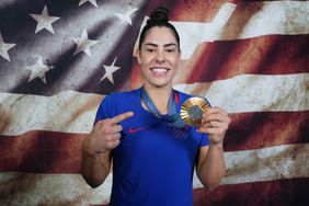  Kelsey Plum poses for a photo after winning the Women's Gold Medal Game on August 11, 2024 