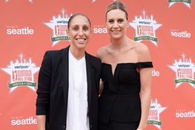 Diana Taurasi #3 of the Phoenix Mercury and Penny Taylor poses for a photo during the WNBA All-Star Welcome Reception Presented by Visit Seattle as part of the 2017 WNBA All-Star Weekend at Chihuly Gardens and Glass on July 21, 2017 in Seattle, Washington.