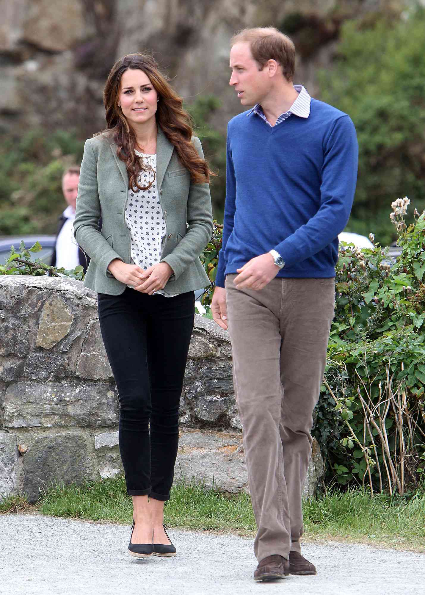 Britain's Prince William, Duke of Cambridge (R), and Catherine, Duchess of Cambridge (L) arrive at Breakwater country park to start the Ring O Fire Anglesey Coastal Ultra Marathon in Holyhead on Anglesey, north Wales, on August 30, 2013. The Duchess of Cambridge made her first public appearance since the birth of Prince George as she joined her husband Prince William at an event on Anglesey.