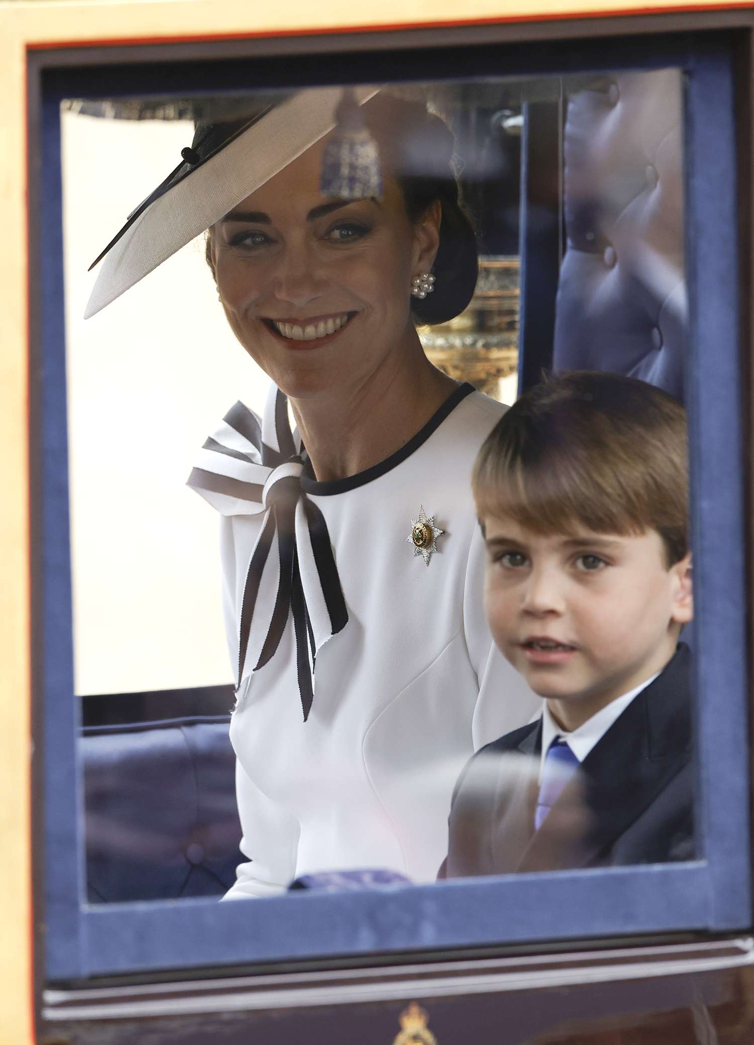 Catherine, Princess of Wales and Prince Louis of Wales during Trooping the Colour at Horse Guards Parade