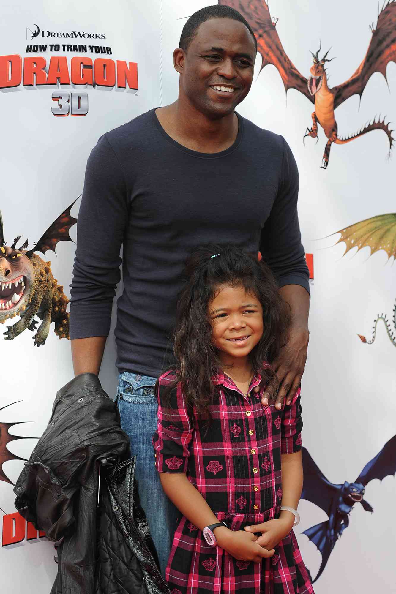 Wayne Brady and daughter Maile arrive for the premiere of DreamWorks' "How To Train Your Dragon" on March 21, 2010. 