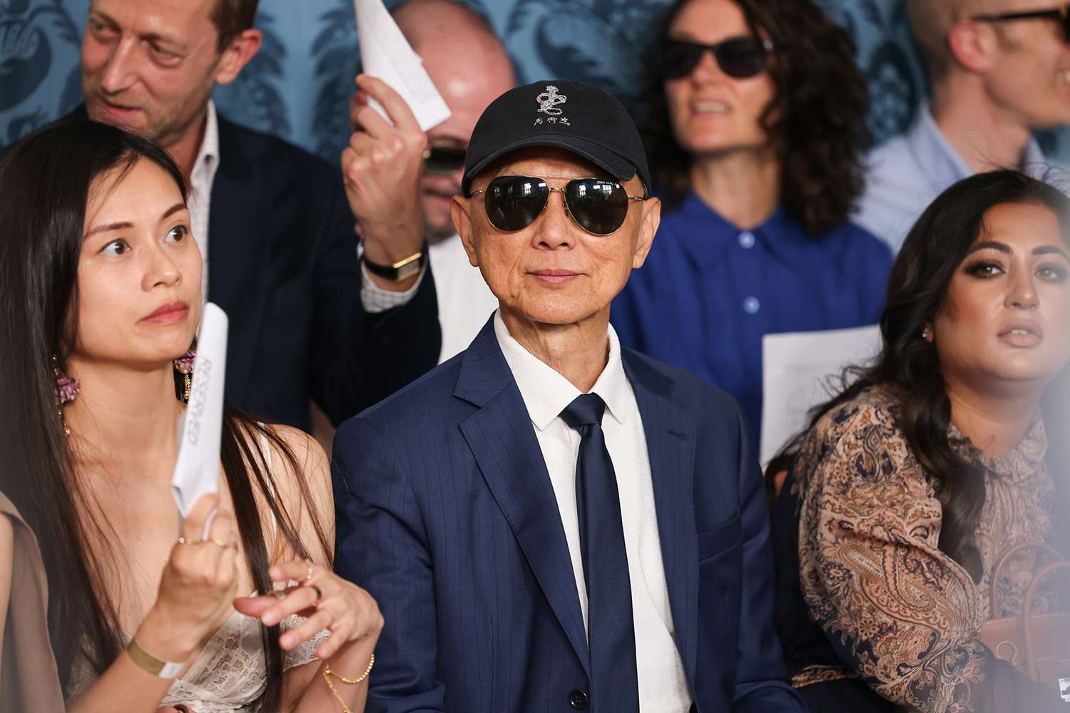 Amanda Li, Prof. Jimmy Choo and Faiza Khan attend the JCA|London Fashion Academy DA Fashion Show at Boston Manor House on June 28, 2024 in London, England.