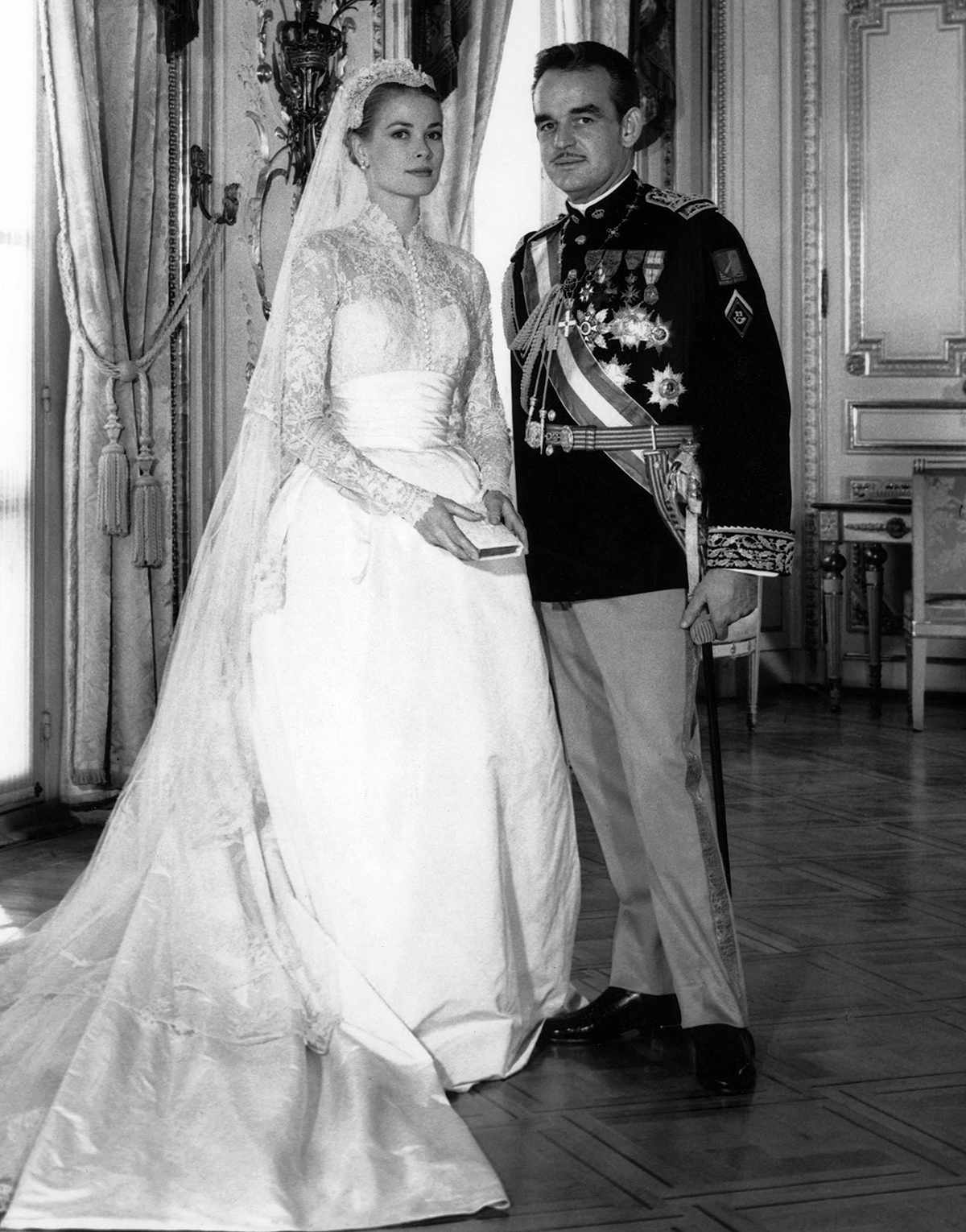 Official picture of US actress Grace Kelly and Prince Rainier of Monaco during their wedding ceremony in Monaco on April 19, 1956.