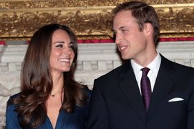 Prince William and Kate Middleton pose for photographs in the State Apartments of St James Palace on November 16, 2010