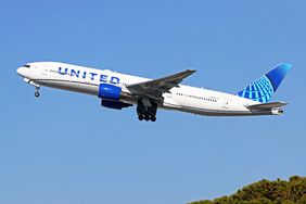 A Boeing 777-222(ER) from United Airlines is taking off