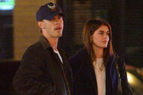 Kaia Gerber and Austin Butler pack on the romance as they share a kiss and hold hands after leaving Highland Park Bowl in Los Angeles, California.