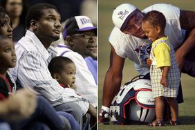 Steve McNair holds his son, Trenton, as they watch the Miami Heat play the Atlanta Hawks in a pre-season game in Nashville on October 24, 2005. ; Steve McNair hangs out with his son Tyler following practice during training camp on August 10, 1999. 