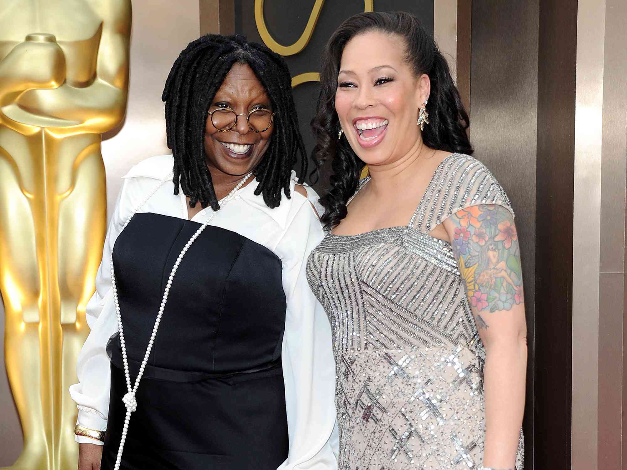 Whoopi Goldberg and Alex Martin attend the 2014 Oscars