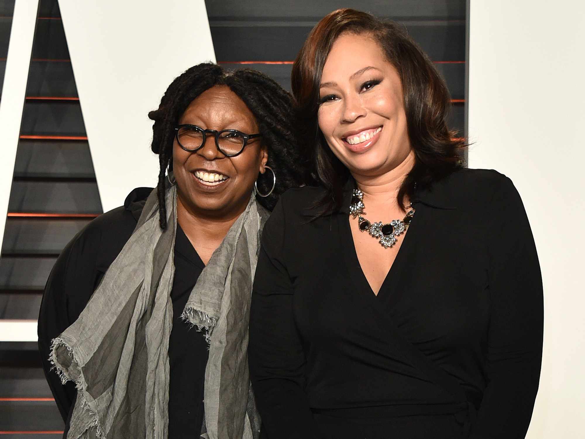 Whoopi Goldberg (L) and Alex Martin arrive at the 2016 Vanity Fair Oscar Party