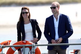 Prince William, Duke of Cambridge and Catherine, Duchess of Cambridge leave Tresco on 'Pegasus' during a visit to Cornwall on September 2, 2016 in Tresco, England.