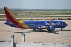 A Southwest Airlines airplane is seen on a tarmac at Will Rogers World Airport Tuesday, April 18, 2023