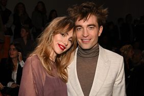 GIZA, EGYPT - DECEMBER 03: Suki Waterhouse and Robert Pattinson attend the Dior Fall 2023 Menswear Show on December 03, 2022 in Giza, Egypt. (Photo by Stephane Cardinale - Corbis/Corbis via Getty Images)