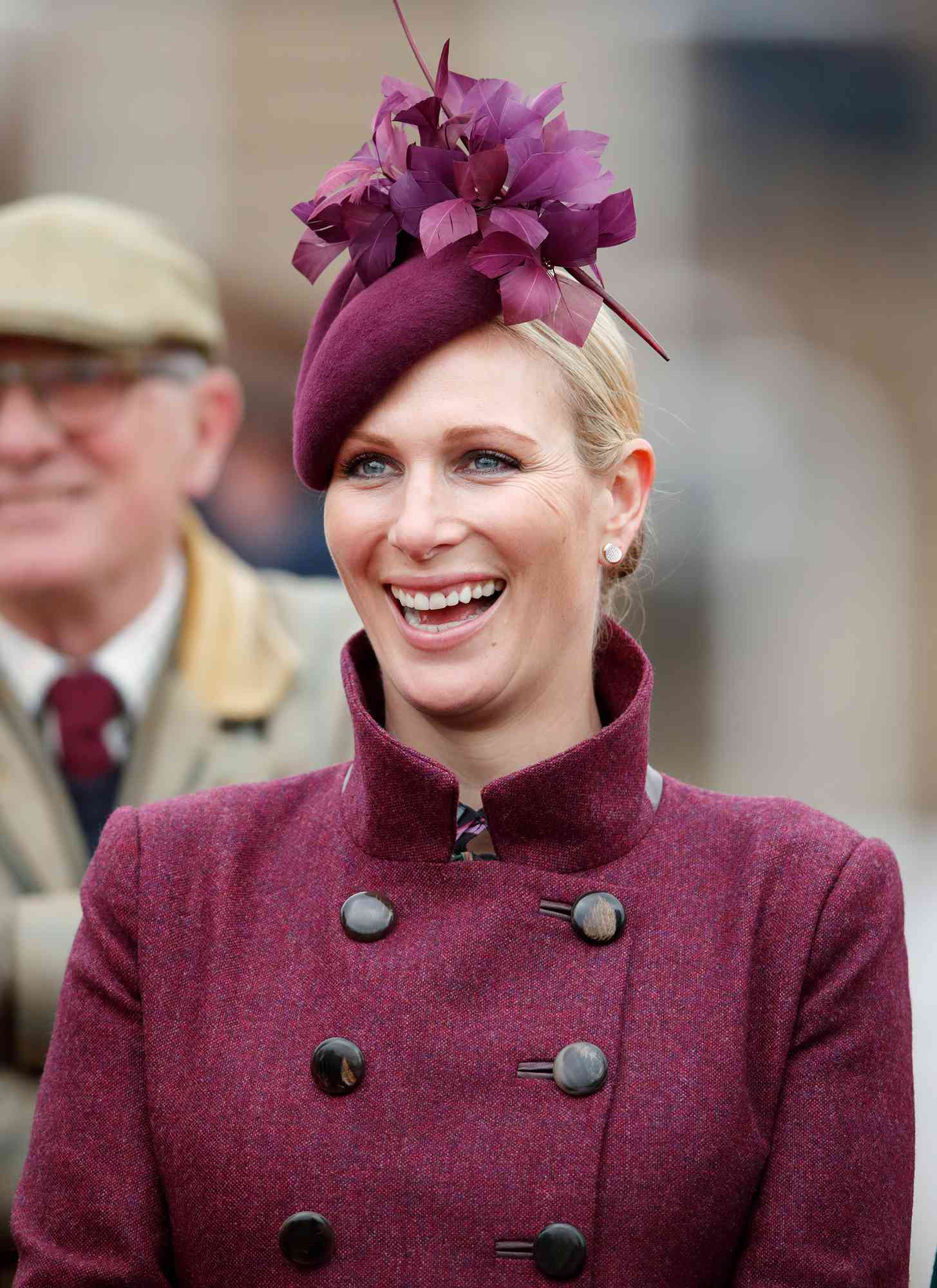 Zara Tindall watches the racing as she attends day 2 'Ladies Day' of the Cheltenham Festival at Cheltenham Racecourse on March 13, 2019 in Cheltenham, England