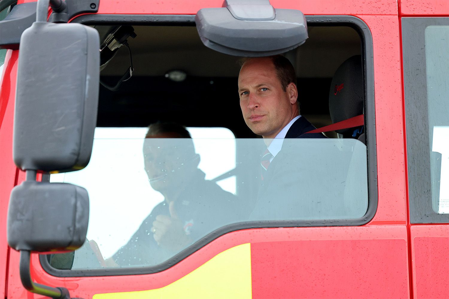 Prince William, Prince of Wales takes part in a simulated fire response exercise during an official visit at RAF Valley on July 09, 2024 in Holyhead, United Kingdom