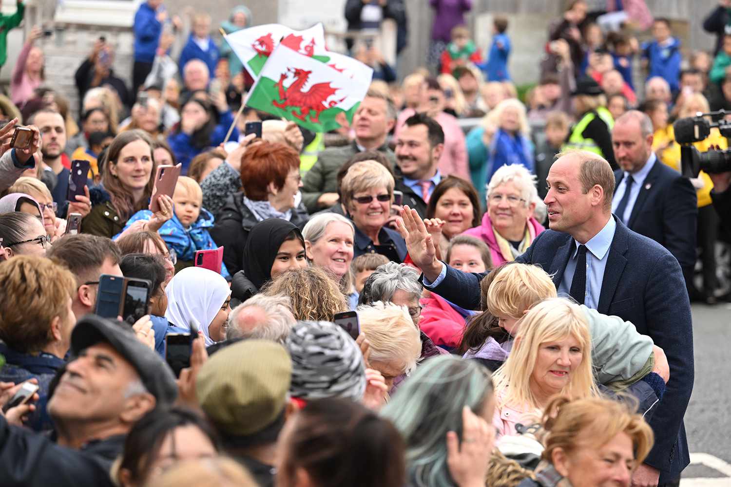 Prince William, Prince of Wales leaves St Thomas Church, which has been has been redeveloped to provide support to vulnerable people, during their visit to Wales on September 27, 2022 in Swansea, Wales.