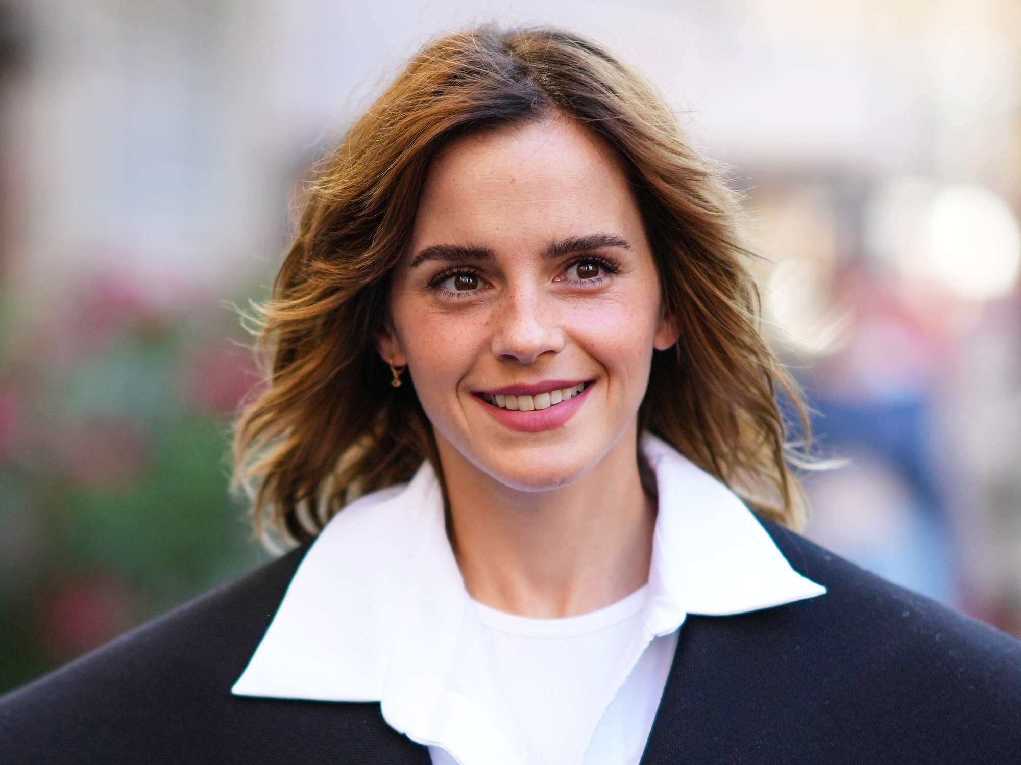 Emma Watson is seen, outside the Schiaparelli show, during Paris Fashion Week - Haute Couture Fall Winter 2022 2023, on July 04, 2022 in Paris, France