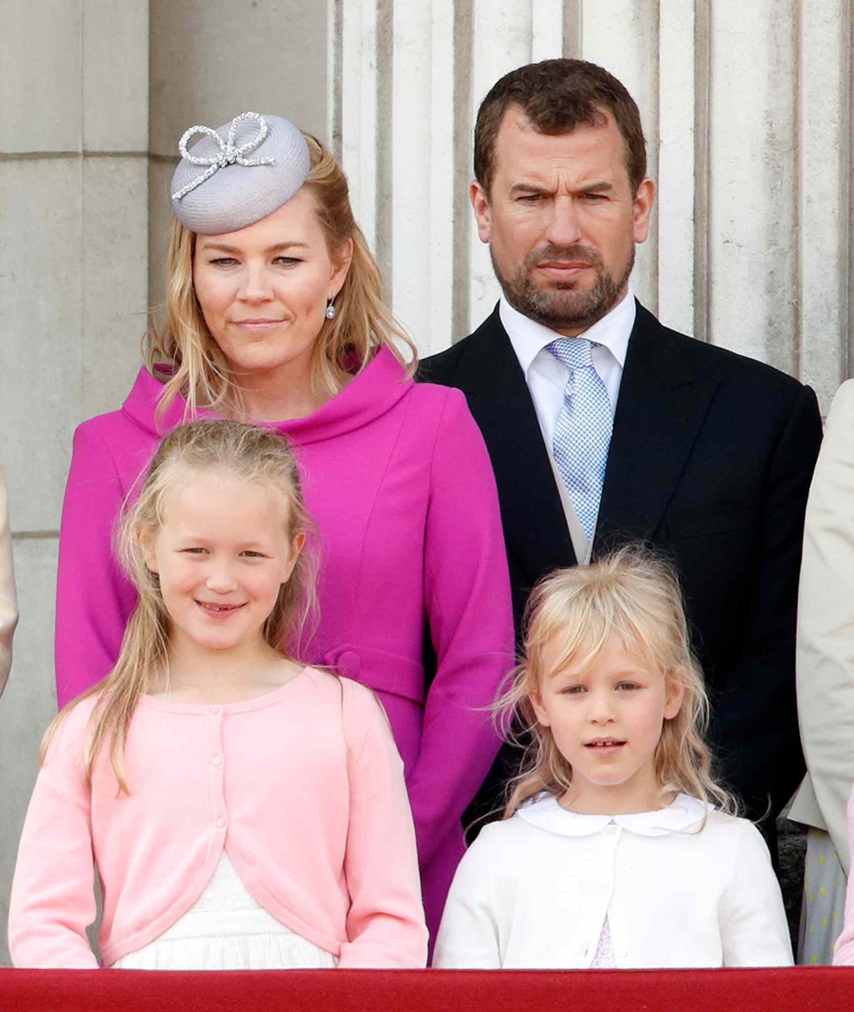 Autumn Phillips, Peter Phillips, Savannah Phillips and Isla Phillips watch a flypast from the balcony of Buckingham Palace during Trooping The Colour, the Queen's annual birthday parade, on June 8, 2019 in London, England