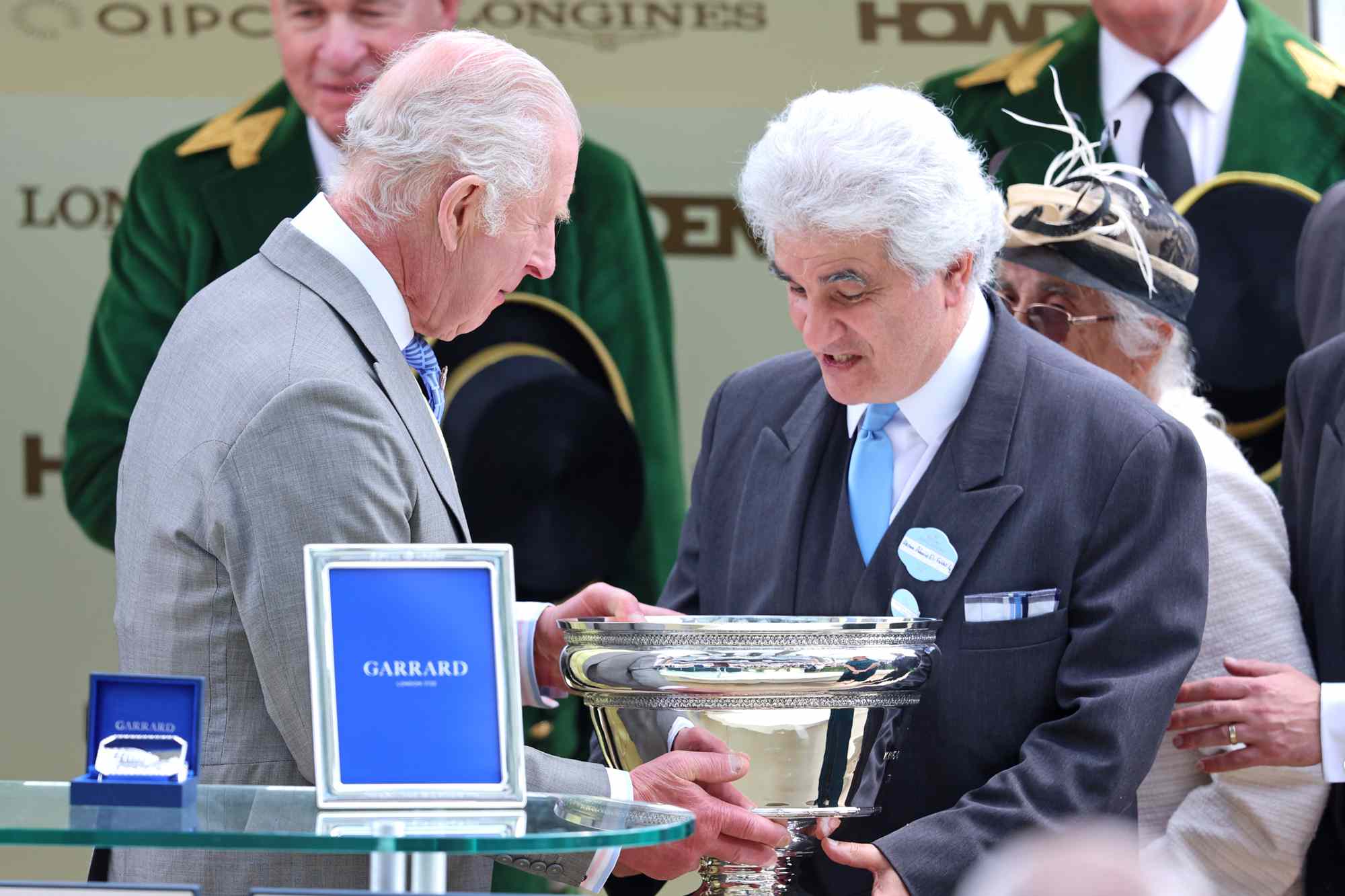 King Charles III presents Akram El-Fahkri with the King Charles III Stakes for Asfoora, winner under Oisin Murphy on day one of Royal Ascot 2024 at Ascot Racecourse on June 18, 2024 in Ascot, England.