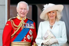 King Charles III, wearing his Irish Guards uniform, and Queen Camilla watch an RAF flypast from the balcony of Buckingham Palace after attending Trooping the Colour on June 15, 2024 in London, England. Trooping the Colour, also known as The King's Birthday Parade, is a military ceremony to mark the official birthday of the British Sovereign. The ceremony takes place at Horse Guards Parade followed by a flypast over Buckingham Palace and was first performed in the mid-17th century during the reign of King Charles II. The parade features all seven regiments of the Household Division with Number 9 Company, Irish Guards being the regiment this year having their Colour Trooped.