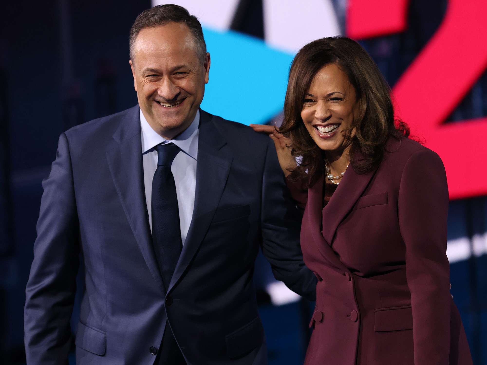 Kamala Harris (D-CA) and her husband Douglas Emhoff appear on stage after Harris delivered her acceptance speech on the third night of the Democratic National Convention from the Chase Center August 19, 2020 in Wilmington, Delaware