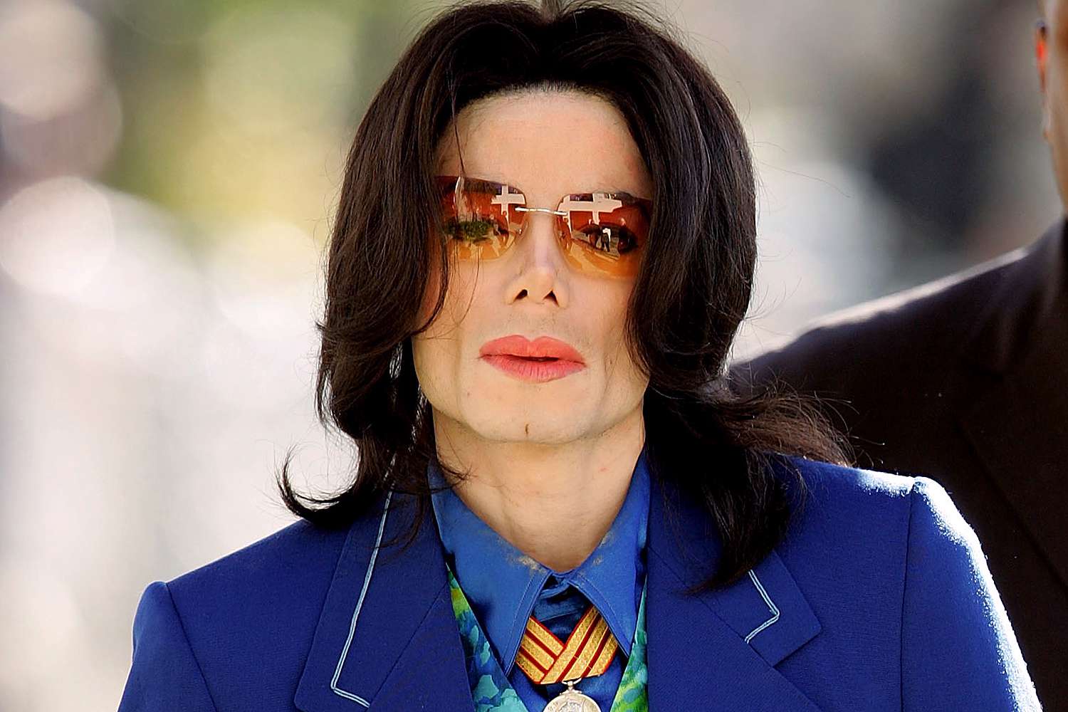 Singer Michael Jackson arrives at Santa Maria Superior Court before testimony in his child molestation trial March 16, 2005 in Santa Maria, California. Jackson is charged in a 10-count indictment with molesting a boy, plying him with liquor and conspiring to commit child abduction, false imprisonment and extortion. He has pleaded innocent. 