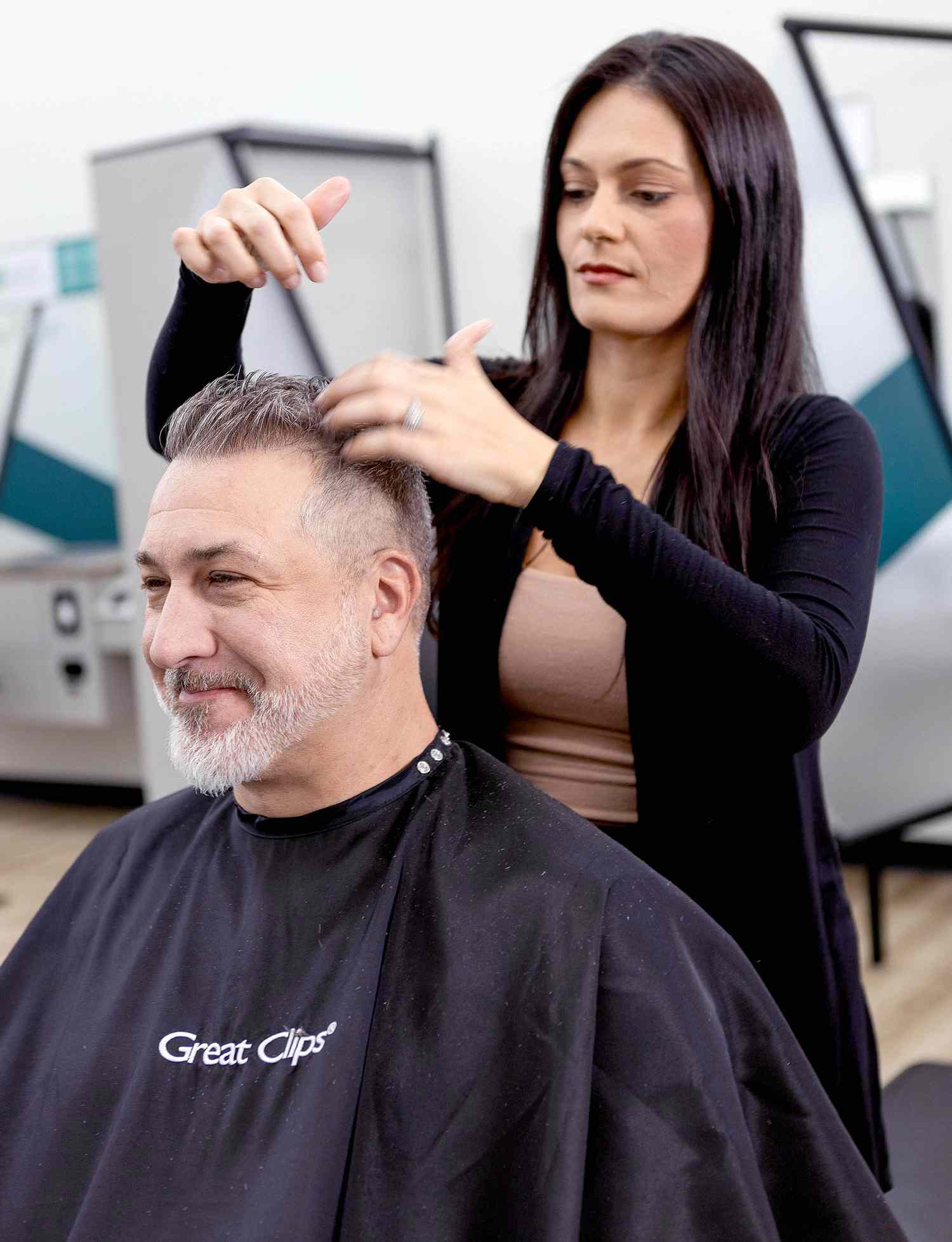 Joey Fatone gets a fresh haircut at Great Clips with his daughter to prepare for the first day of school.