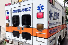 Emergency Medical Services Paramedic Unit Ambulance parked on small lane.
