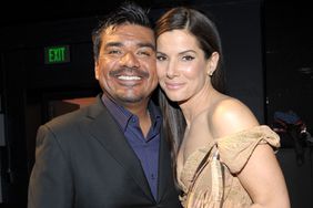 Comedian George Lopez and actress ;Sandra Bullock backstage during the People's Choice Awards 2010 held at Nokia Theatre L.A. Live on January 6, 2010 in Los Angeles, California. 