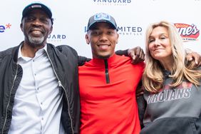 Amon-Ra St. Brown and his parents John and Miriam Brown after being selected in the NFL draft on May 1, 2021. 