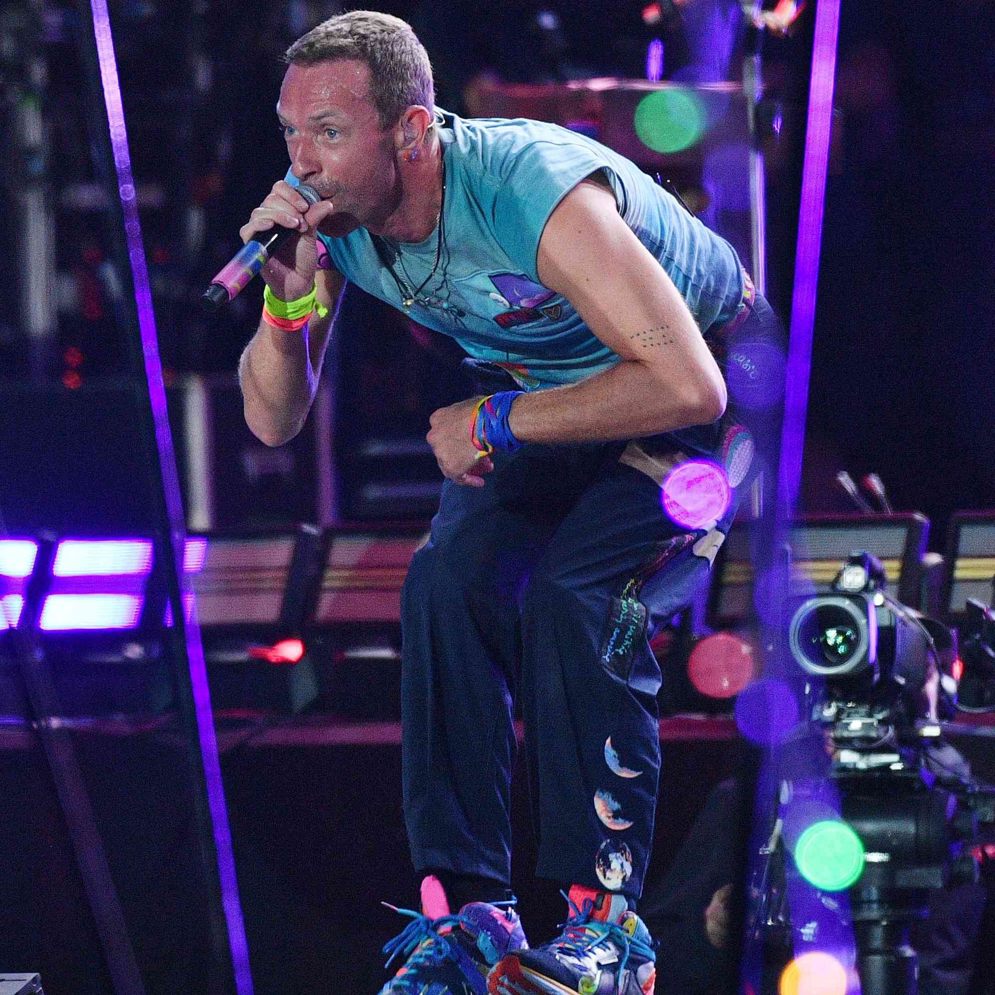 Chris Martin of Coldplay performs on the Pyramid stage during day four of Glastonbury Festival 2024 at Worthy Farm, Pilton on June 29, 2024 in Glastonbury, England