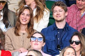 Alexa Chung and Joe Alwyn attend day ten of the Wimbledon Tennis Championships at the All England Lawn Tennis and Croquet Club on July 10, 2024 in London, England