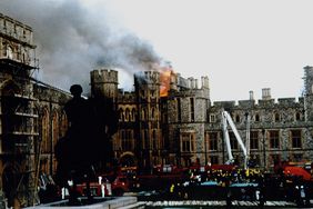 FIRE AT WINDSOR CASTLE - Firemen fighting against fire.