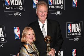 Dinah Mattingly and Larry Bird pose with the 'Lifetime Achievement' award in the press room during the 2019 NBA Awards on June 24, 2019 in Santa Monica, California. 