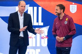 England manager Gareth Southgate (R) listens as Prince William, Prince of Wales speaks at St Georges Park on June 10, 2024 in Burton-upon-Trent, England.