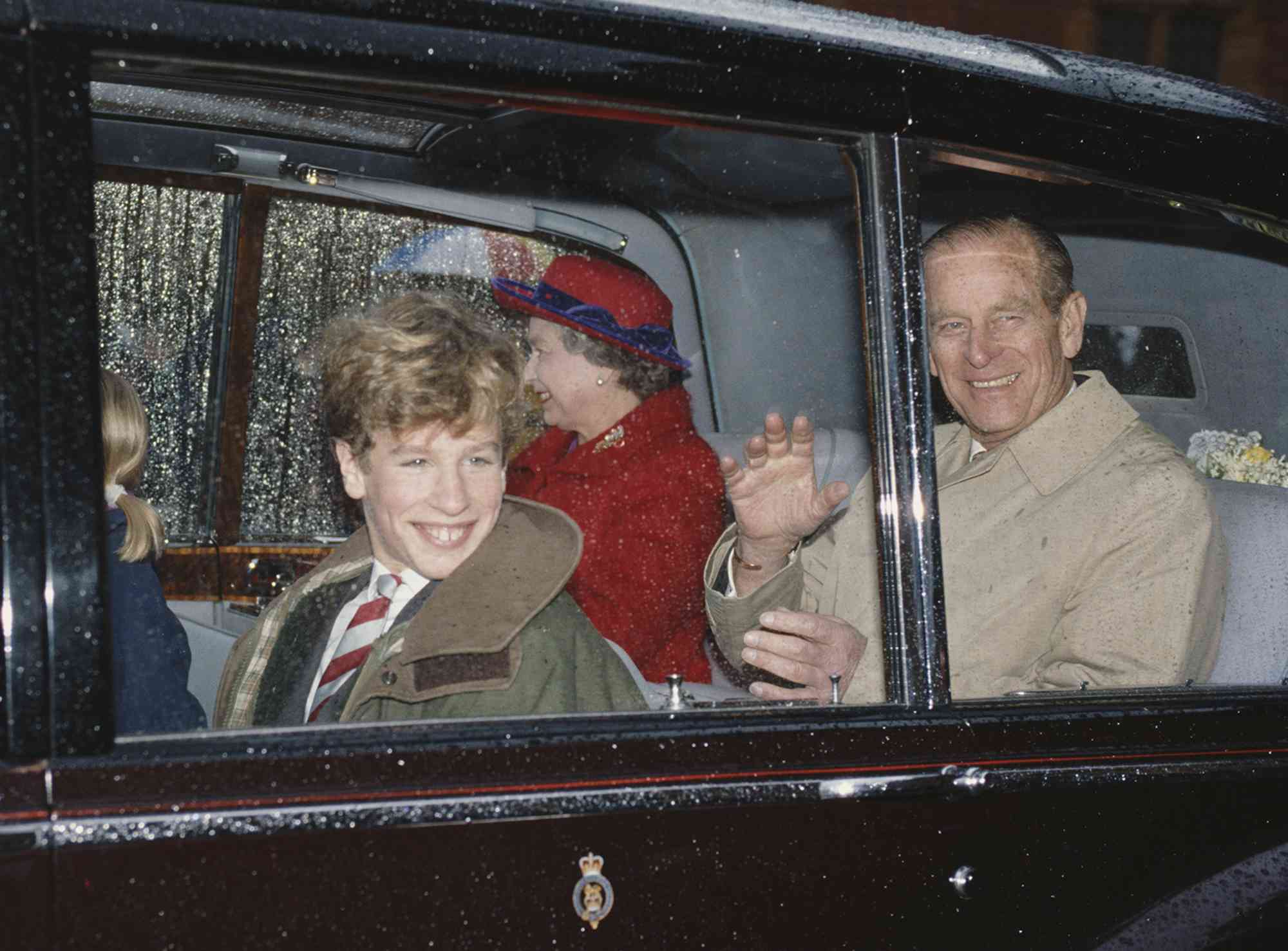 Queen Elizabeth II visits Port Regis School in Shaftesbury, Dorset, with her husband Prince Philip and their grandson Peter Phillips