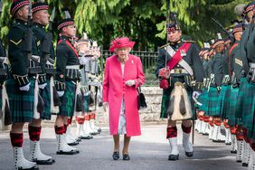 Queen Elizabeth II during an inspection of the Balaklava Company, 5 Battalion The Royal Regiment of Scotland at the gates at Balmoral, as she takes up summer residence at the castle, on August 9, 2021 in Ballater, Aberdeenshire.