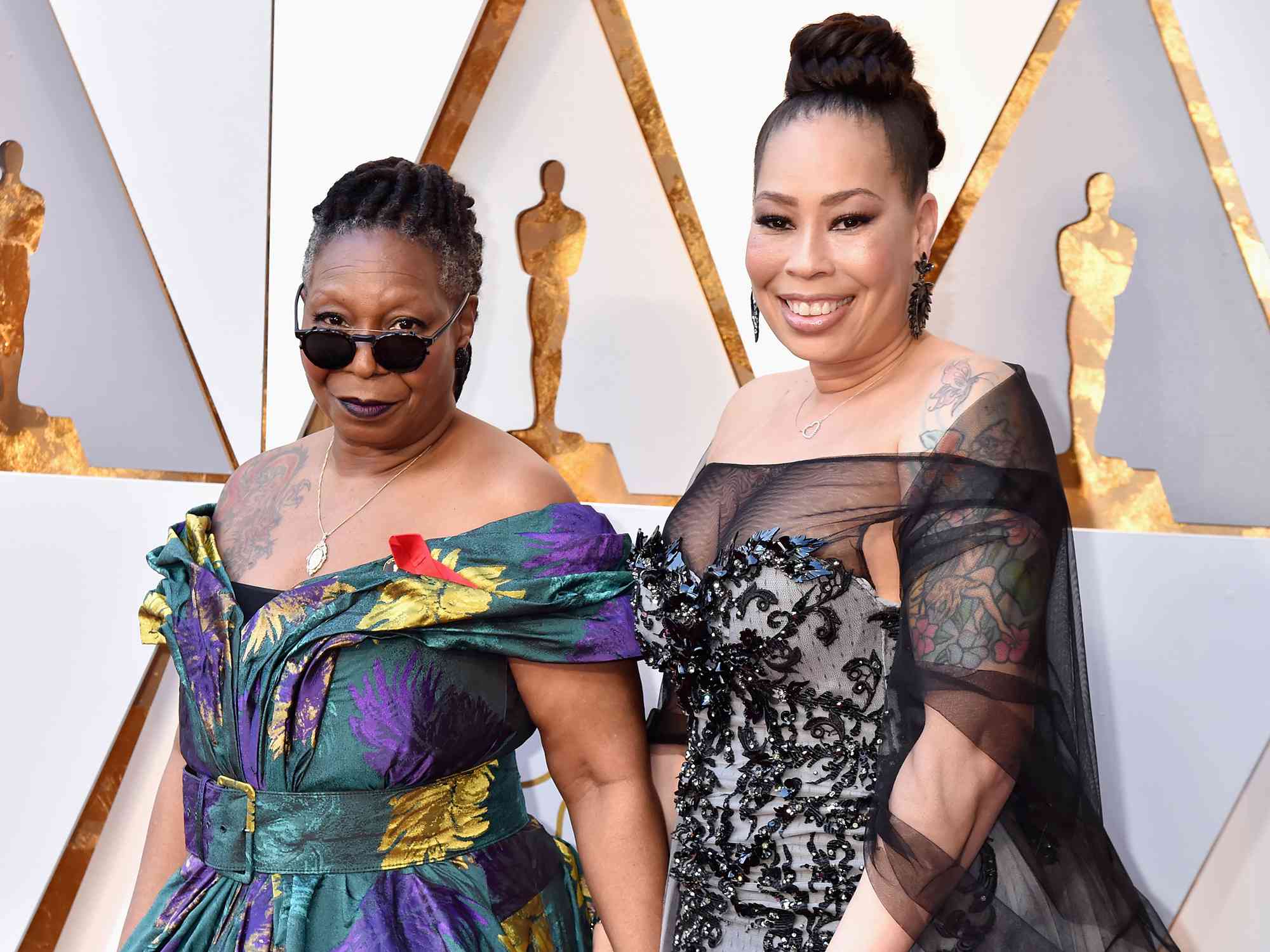 Whoopi Goldberg (L) and Alex Martin attends the 90th Annual Academy Awards