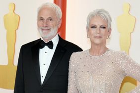 Christopher Guest and Jamie Lee Curtis attend the 95th Annual Academy Awards on March 12, 2023 in Hollywood, California.