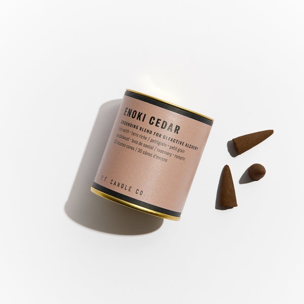 P.F. Candle Co. Enoki Cedar Alchemy Incense Cones - Product - Each cone burns for approximately 20-25 minutes each. Our wood-based incense cones are hand-dipped into fine fragrance oils at our Los Angeles factory.