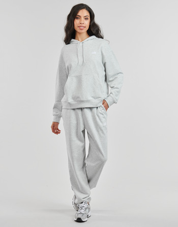 Kleidung Damen Jogginghosen New Balance FRENCH TERRY JOGGER Grau