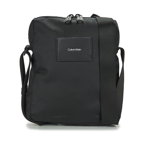 Sacs Homme Pochettes / Sacoches Calvin Klein Jeans CK MUST T REPORTER Noir