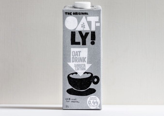 Photo shows a carton of Oatly's popular barista style oat milk