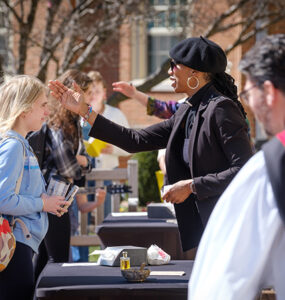 A university Chaplain reaches out to to a student during a faith event on Hearn Plaza at WFU.