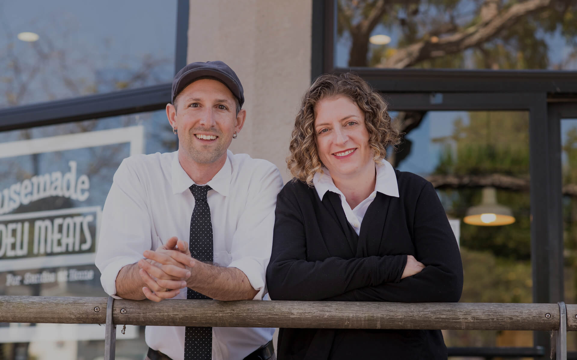 Monica and Aaron Rocchino, Former owners of The Local Butcher Shop, standing outside their former storefront​, having transitioned to employee ownership