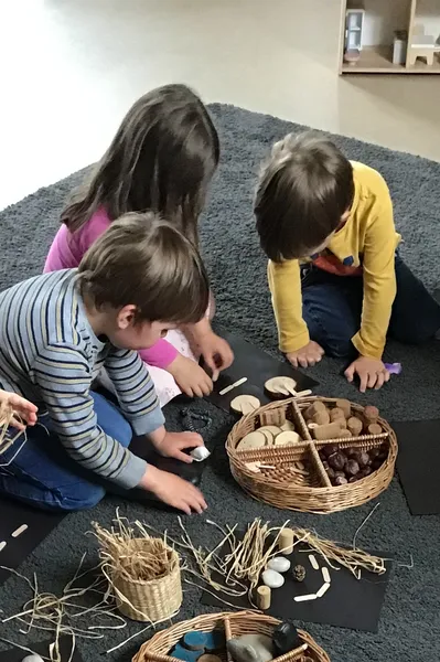 Child playing with wooden toys