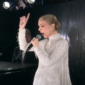 Celine Dion sings at the Paris Olympics opening ceremony.