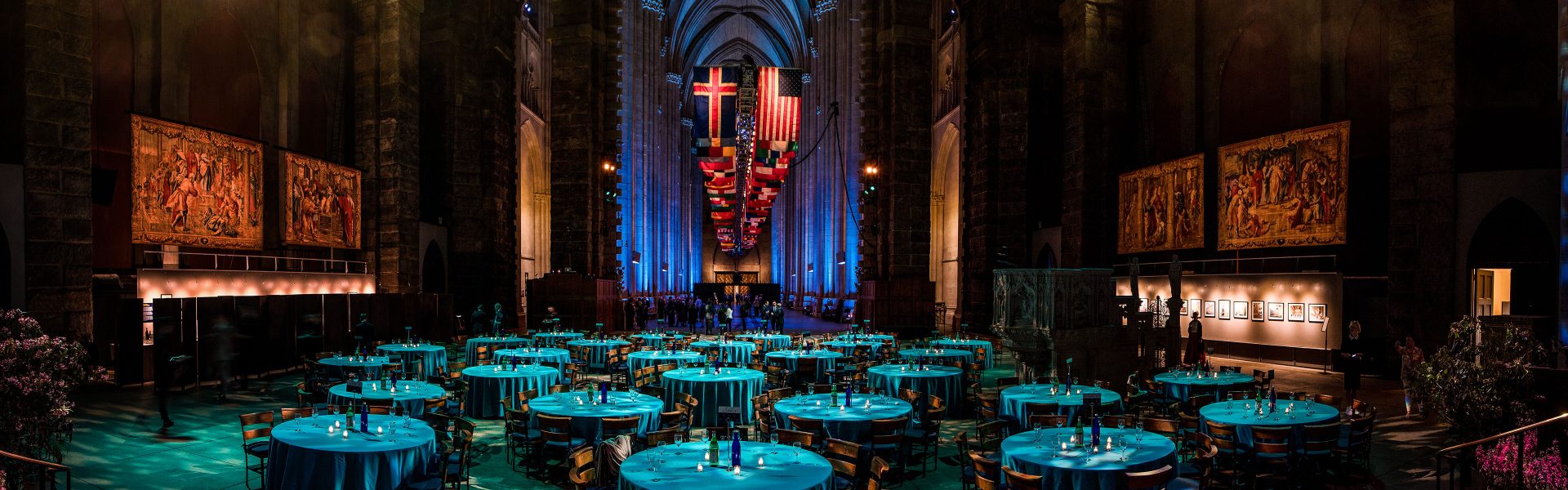 Indoor catered social event with blue lighting