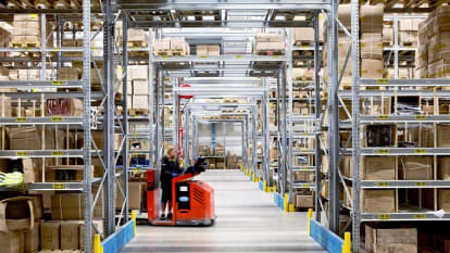 Picture of the interior of a warehouse with boxes.